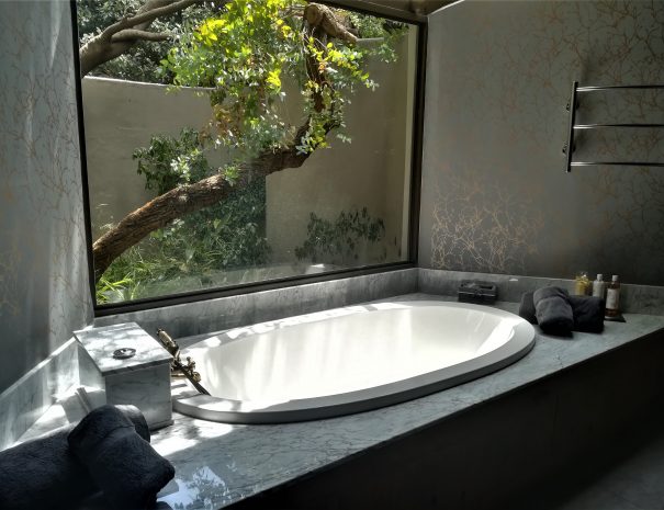bathroom huge window ktp luxe bathtub